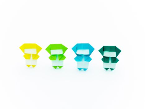 Colorful origami ninjas are cute and playing together.