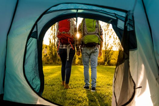 Shot of a happy couple camping on the nature