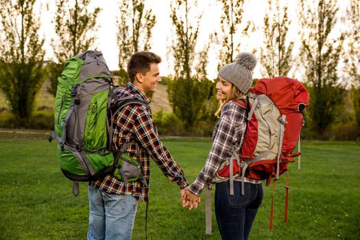 Shot of a young couple with backpacks ready for camping