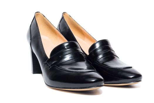 Black female shoes on a white background, isolated, studio