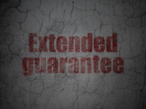 Insurance concept: Red Extended Guarantee on grunge textured concrete wall background