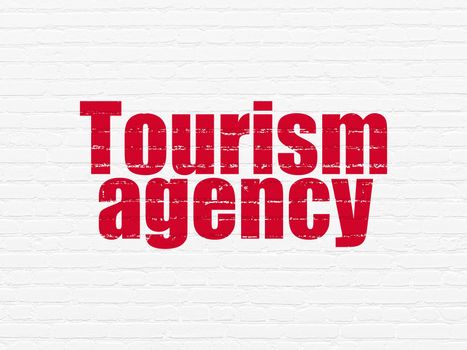 Vacation concept: Painted red text Tourism Agency on White Brick wall background