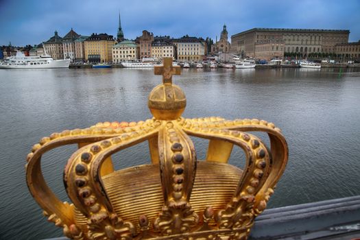 Skeppsholmsbron (Skeppsholm Bridge) with Golden Crown on a bridge in Stockholm, Sweden