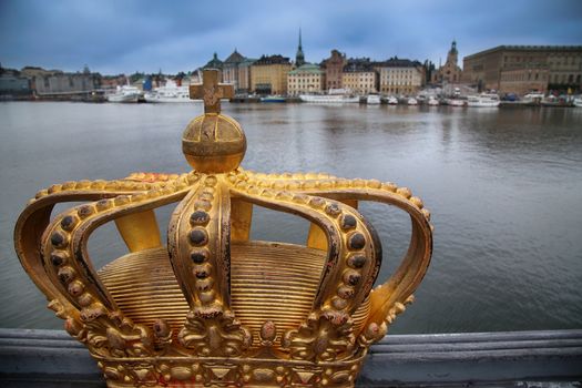 Skeppsholmsbron (Skeppsholm Bridge) with Golden Crown on a bridge in Stockholm, Sweden