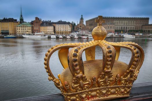 Skeppsholmsbron (Skeppsholm Bridge) with Golden Crown on a bridge in Stockholm, Sweden