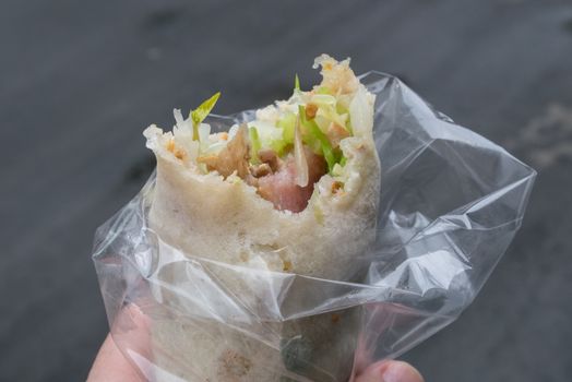 The close up of delicious Taiwan spring roll at food street market in Taipei, Taiwan.
