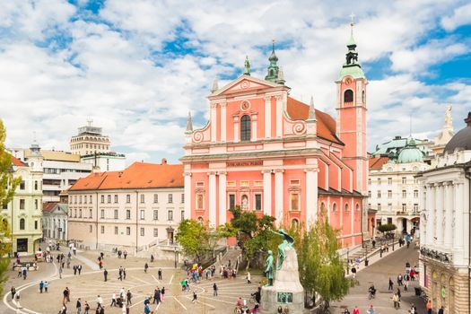 Romantic Ljubljana's city center: river Ljubljanica, Triple Bridge, Tromostovje, Preseren square and Franciscan Church of the Annunciation. Ljubljana, Slovenia, Europe.