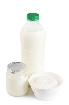 Milk and yogurt isolated on white background