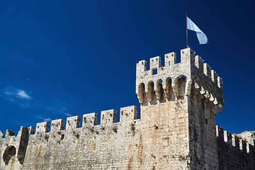 Tower and walls of Venetian fortress in the town of Trogir in Croatia