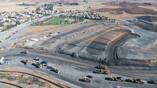 Aerial View Of Tractors On A Housing Development Construction Site.