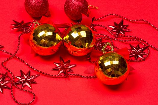 Christmas red background with gift and decoration on the red background