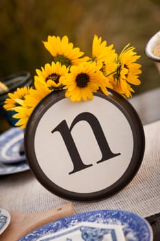 Beautiful rustic table setting with the letter "N" incorporated.