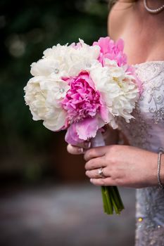Beautiful White & Pink Bouquet Held by Wedding
