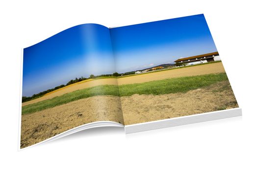 book of fields, cellar and village in the distance