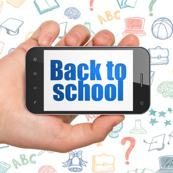 Education concept: Hand Holding Smartphone with  blue text Back to School on display,  Hand Drawn Education Icons background, 3D rendering