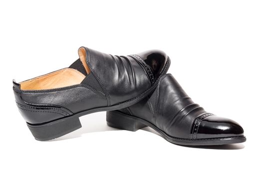 Black female shoes on a white background, isolated, studio