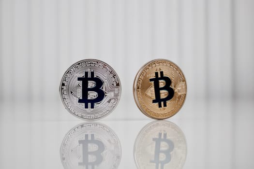Digital currency physical silver and gold bitcoin coin.