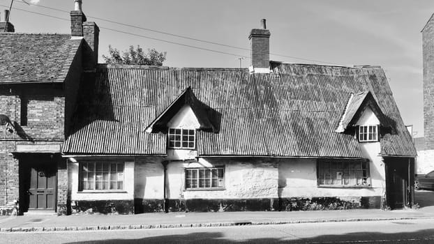 Old house in Newport Pagnell. Ruins near the road in England.