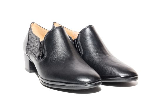 Black female shoes on a white background, isolated, studio