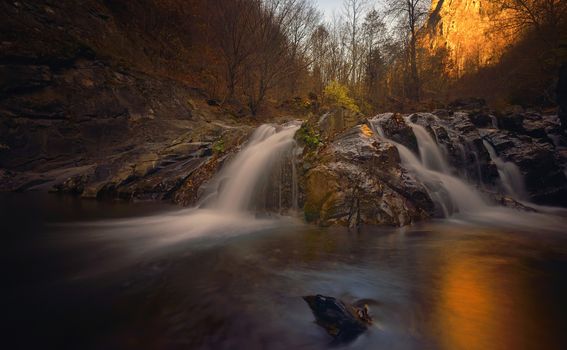 Autumn landscape with trees and river