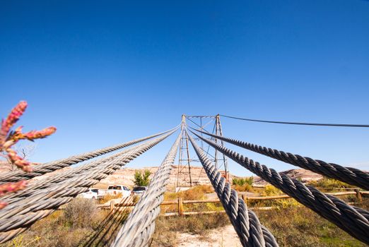 The suspension cables of the historic Dewey Bridge over the Colorado River, near Moab Utah.