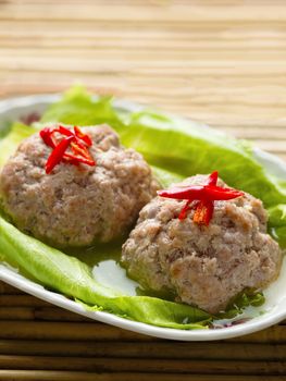 close up of chinese steamed lion head pork meat ball