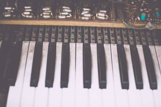 Old retro unnecessary faulty musical synthesizer, equipment controller. Installation Krakow, Poland