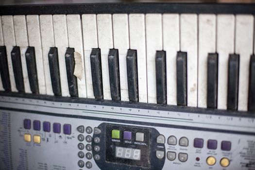 Old retro unnecessary faulty musical synthesizer, equipment controller. Installation Krakow, Poland
