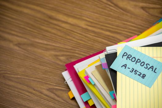 Proposal; The Pile of Business Documents on the Desk