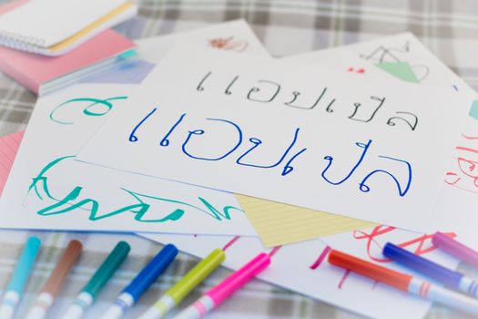 Thai; Kids Writing Name of the Fruits for Practice (Translation; Apple)