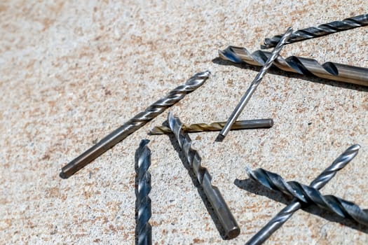 The Isolated Drill Bits with the Gray Ground Background