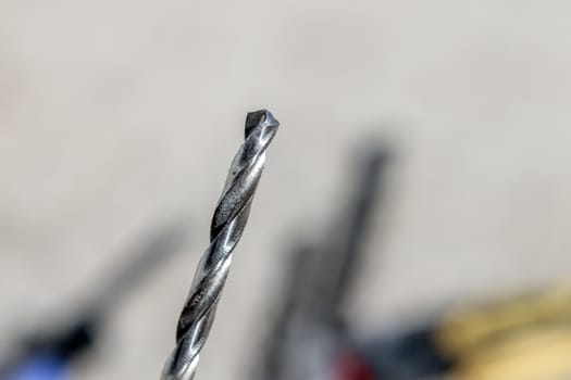 The Isolated Drill Bits with the Gray Ground Background