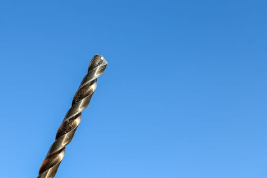 The Isolated Drill Bits with the Blue Sky Background