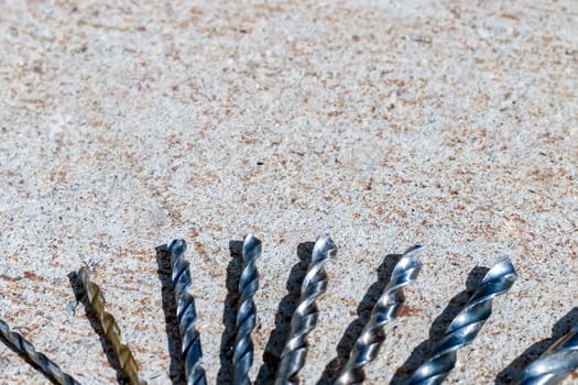 The Isolated Drill Bits with the Gray Ground Background