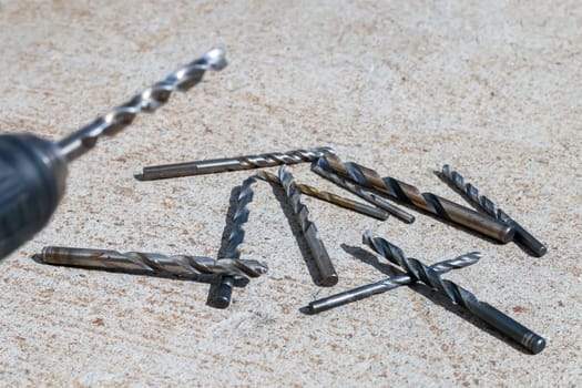 The Isolated Drill Bits with the Gray Ground Background