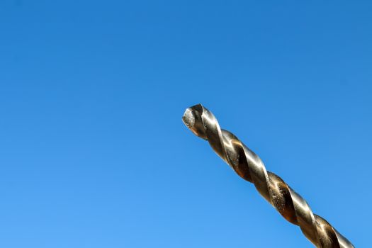 The Isolated Drill Bits with the Blue Sky Background