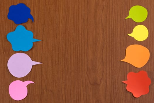 The Handmade Colorful Origami Balloons on the Wooden Background