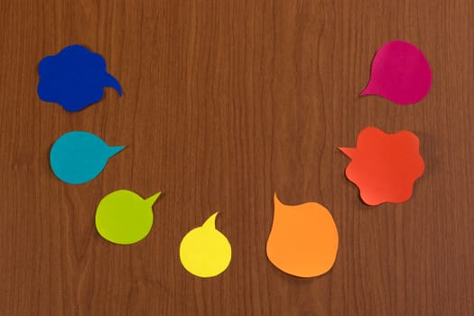 The Handmade Colorful Origami Balloons on the Wooden Background