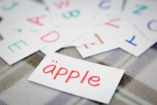 Swedish; Learning the New Word with the Alphabet Cards; Writing APPLE