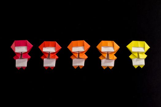 The Handmade Origami Ninja Kids on the Black Background