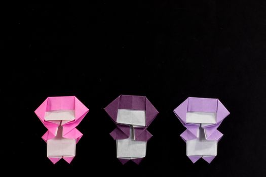 The Handmade Origami Ninja Kids on the Black Background