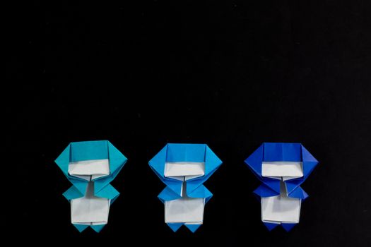 The Handmade Origami Ninja Kids on the Black Background