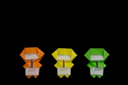 The Handmade Origami Ninja Kids on the Black Background