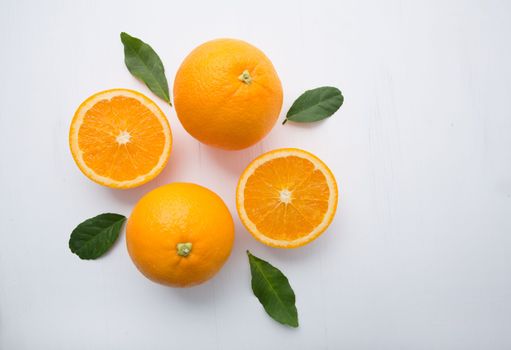 Fresh orange citrus fruit on white background. Top view