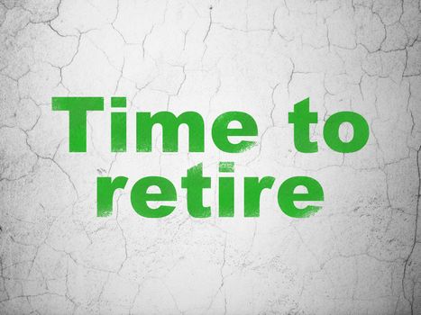 Time concept: Green Time To Retire on textured concrete wall background