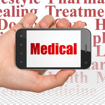 Medicine concept: Hand Holding Smartphone with  red text Medical on display,  Tag Cloud background, 3D rendering
