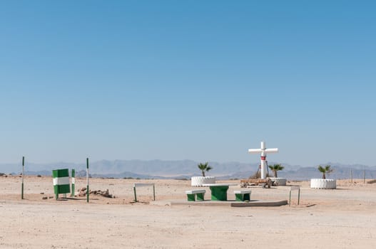 A picnic spot with memorial cross next to the B2-road between Arandis and Usakos in the Namib Desert of Namibia