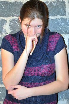 Female beauty fashion model in studio basement.