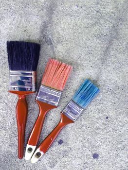 Paint brush on cement floor