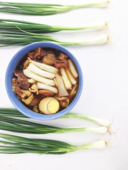 Chinese roll noodle soup and spring onion